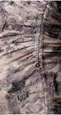 Close-up of textured viscose blend fabric and fine rouching detail on the waist. Luna Fashion House