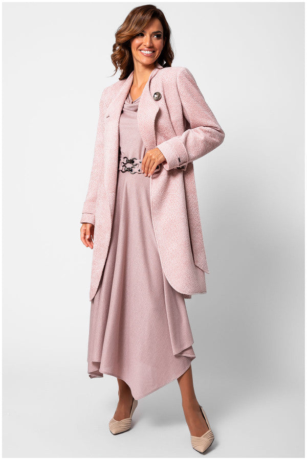 Woman wearing a pink coat over a dress on a white background Luna Fashion House