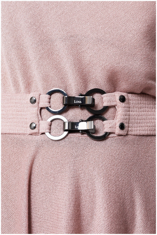 Close-up of a pink dress with a belt featuring silver buckles and black hardware. Luna Fashion House