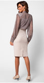 Woman wearing a sheer brown blouse over a white skirt on a white background  Luna Fashion House