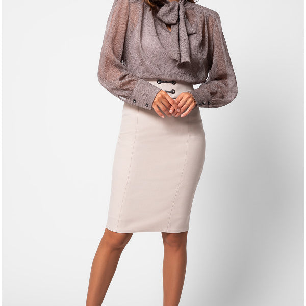 Woman wearing a gray blouse with a bow and a beige skirt on a white  background Luna Fashion House