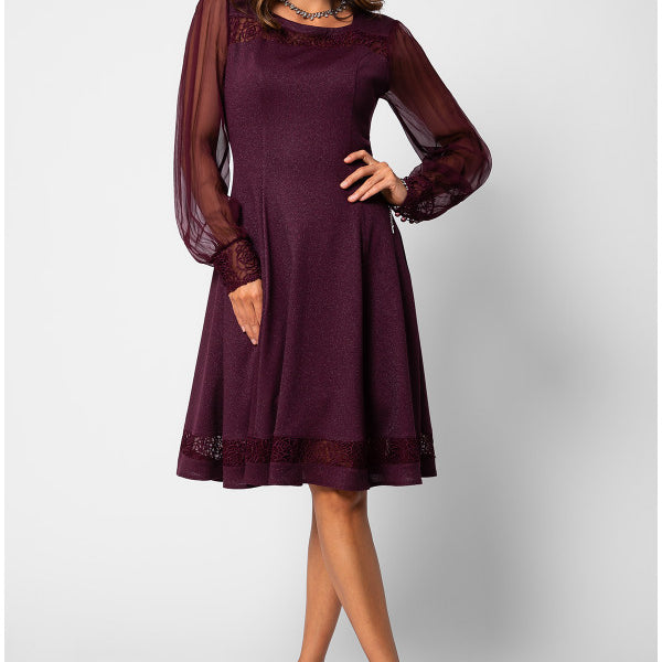 Woman wearing a burgundy dress with sheer sleeves on a white background Luna Fashion House
