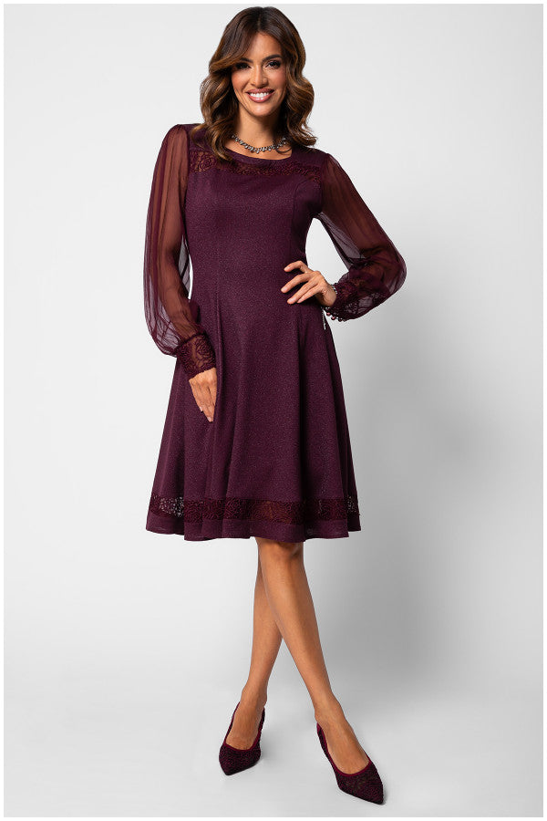 Woman wearing a burgundy dress with sheer sleeves on a white background Luna Fashion House