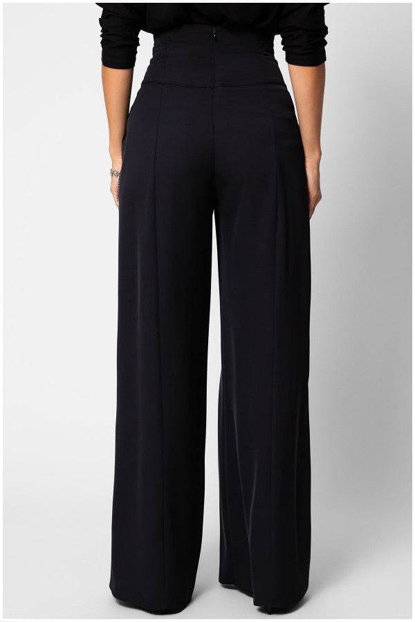 Back view of high waisted wide leg pants black Agatha Pants with a structured, wrinkle-resistant fabric design.