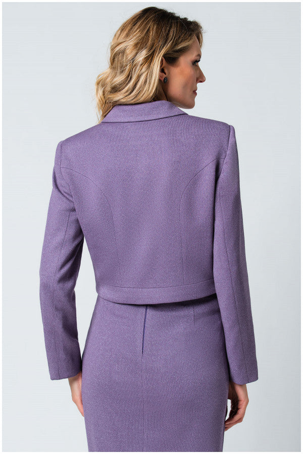Woman wearing a purple suit on a light gray background Luna Fashion House