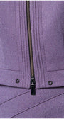 Close-up of a purple jacket with a zipper and button details. Luna Fashion House
