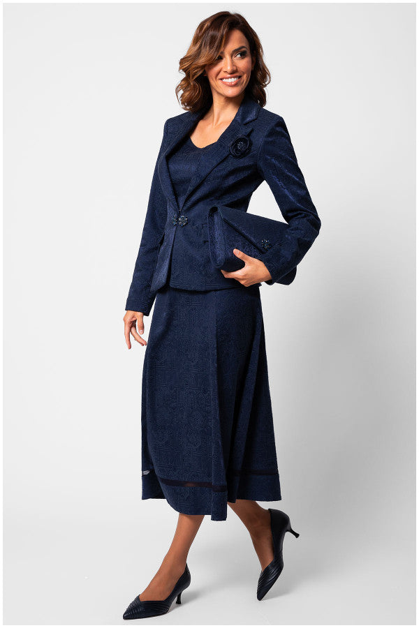 Woman wearing a navy blue suit on a white background