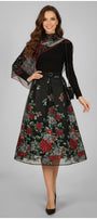 Woman wearing a black dress with floral patterns on a gray background