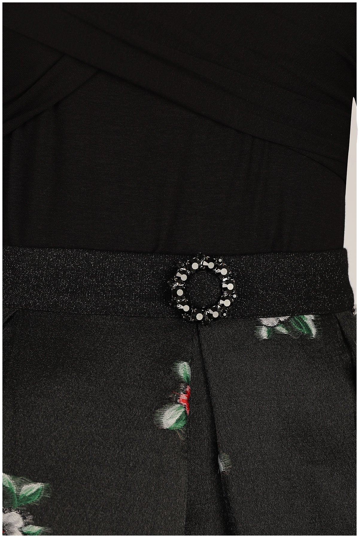 Black dress with floral patterns and a decorative belt featuring a circular design. Luna Fashion House