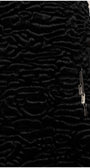 Close-up of a textured black fabric with a zipper detail.