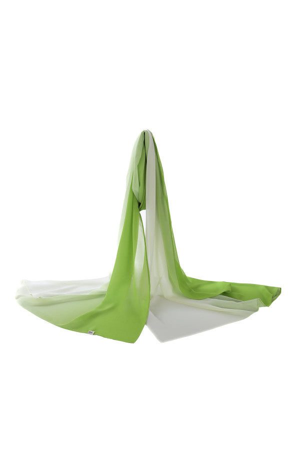 Lightweight green scarf in green ombre fabric, flowing elegantly to add texture and sophistication to any outfit.