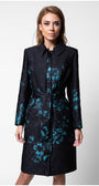 Woman wearing a black coat with blue floral patterns on a white background Luna Fashion House design