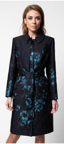 Woman wearing a black coat with blue floral patterns on a white background Luna Fashion House design