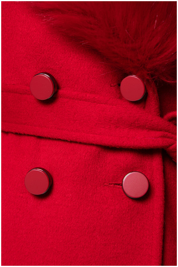 Close-up of a red coat with buttons and fur trim  Luna Fashion House design
