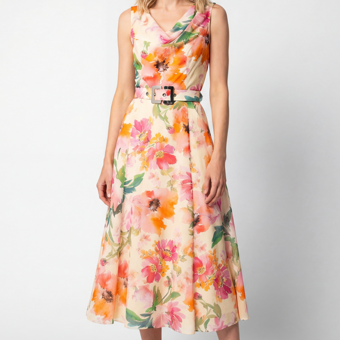 Floor length beige floral lace gown with cap sleeves and fitted bodice on a woman at a formal vow renewal ceremony