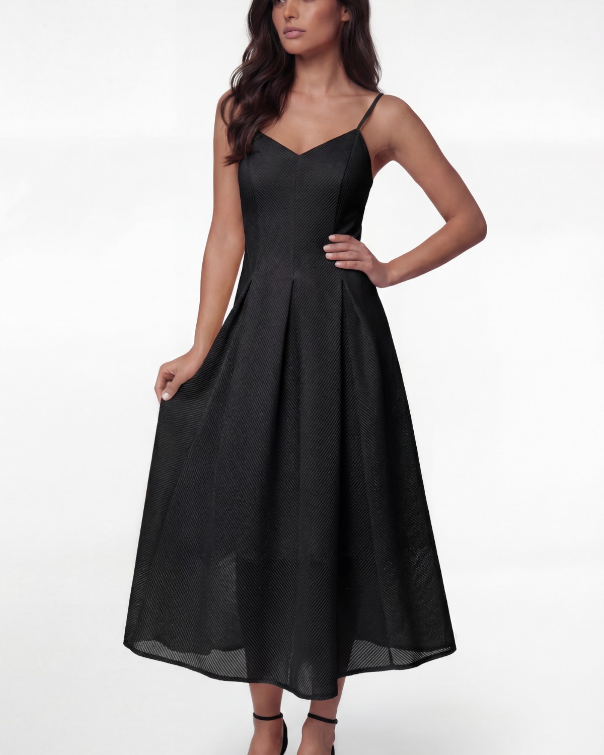Four elegant handmade European dresses for wedding guests including a champagne gold off shoulder cocktail dress, an ivory lace cocktail dress, and two black midi dresses displayed against a soft neutral background