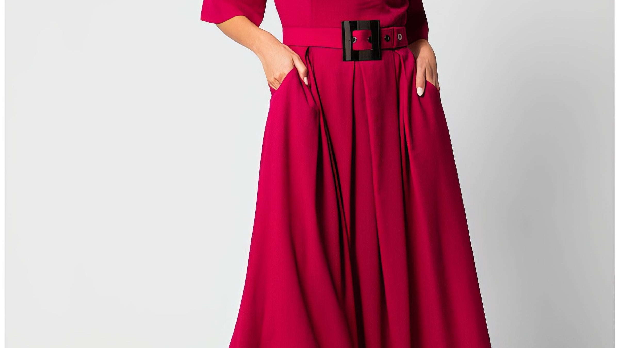 Navy wrap midi dress with short sleeves and adjustable waist tie, shown in a refined European tailoring cut suitable for graduation
