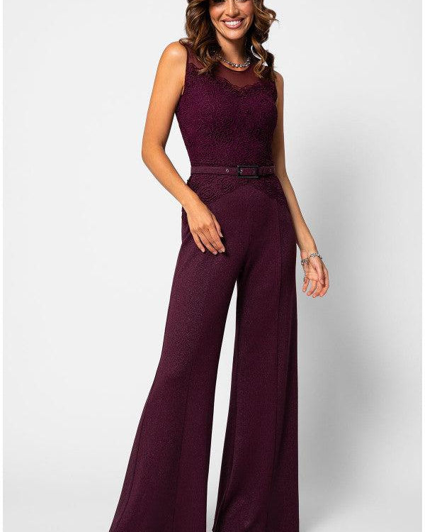 An elegant handmade lace jumpsuit in burgundy displayed against a soft neutral background, styled as a sophisticated wedding guest outfit