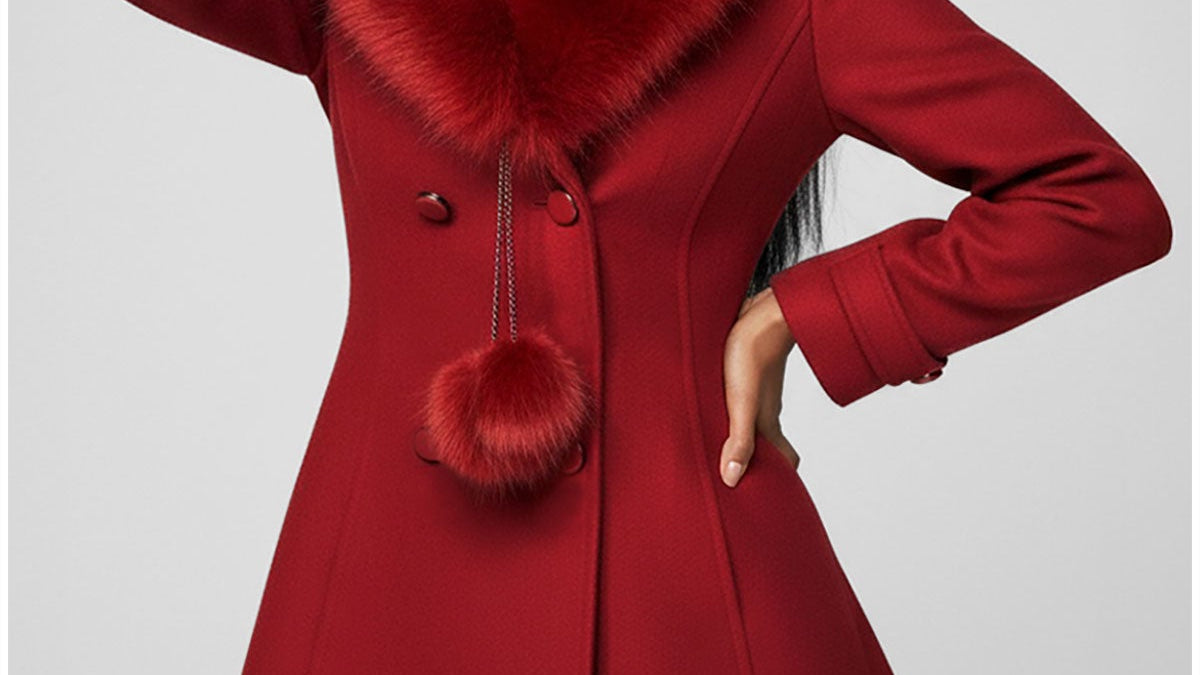 Red long-fiber wool coat, Lucy, fitted through the waist with a large red faux-fur collar, double-breasted buttons, and a flared knee-length skirt