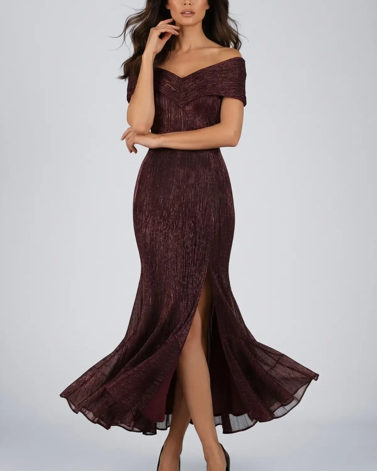 A selection of handmade European eveningwear gowns from Luna Fashion House including metallic, lace, and sequin designs in burgundy, navy, beige, and green with black