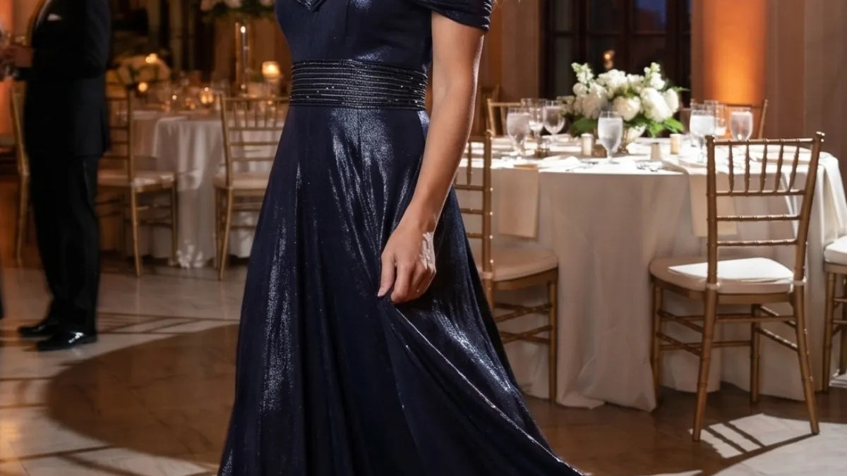Navy off shoulder gown at an evening dinner