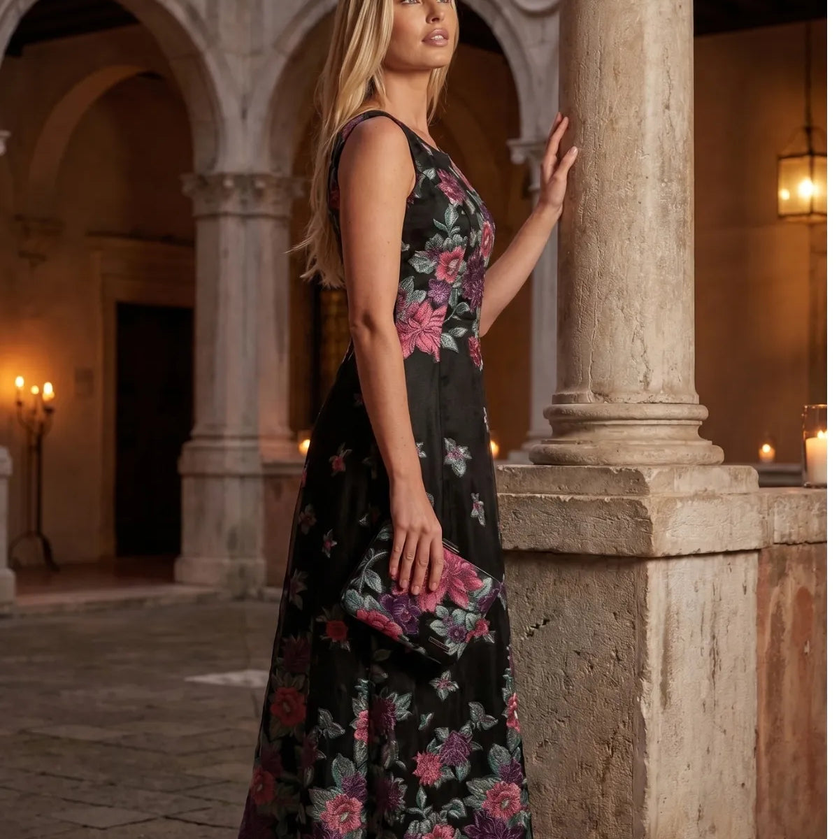Woman in soft neutral summer dressing on a South of France terrace