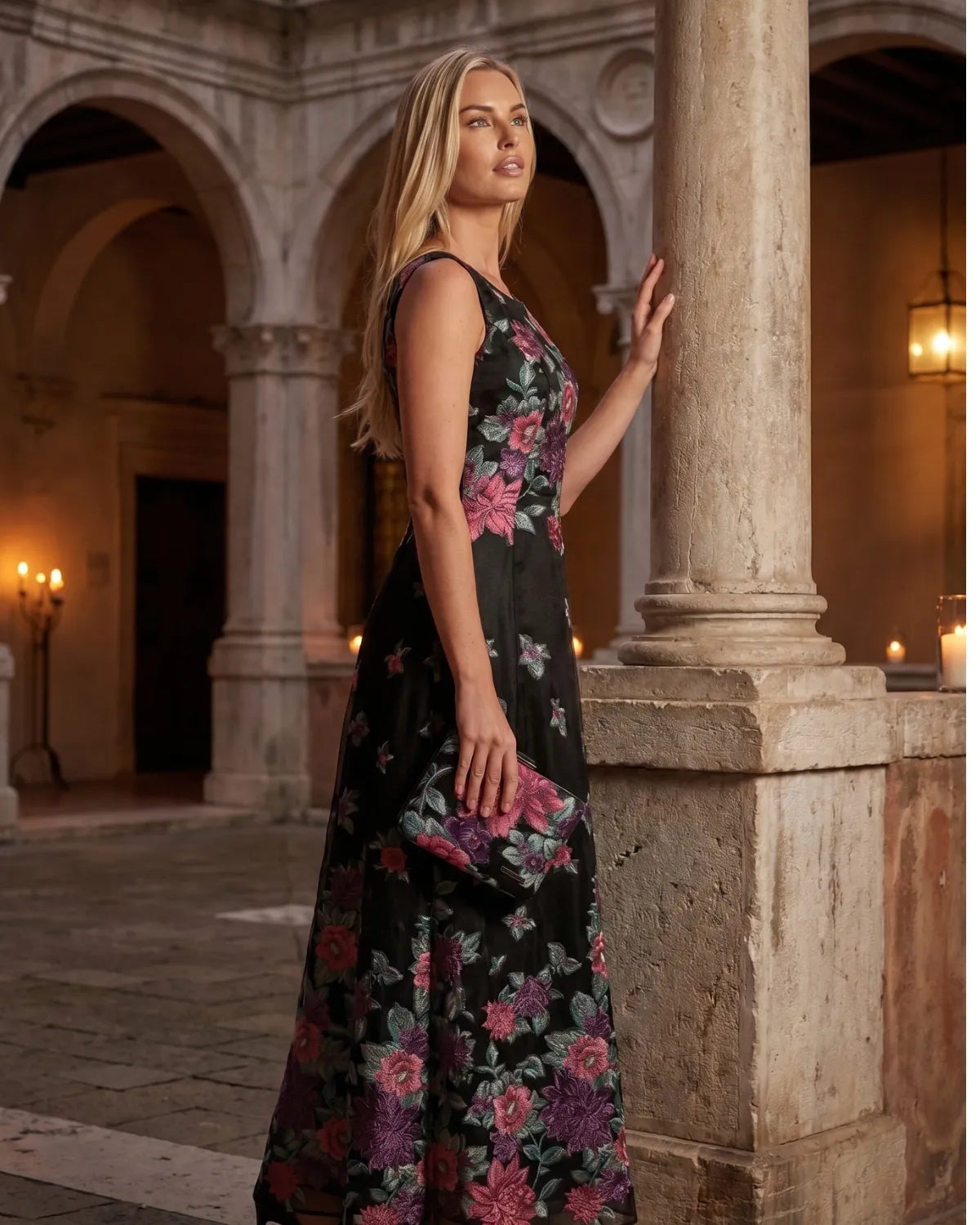 Woman in soft neutral summer dressing on a South of France terrace