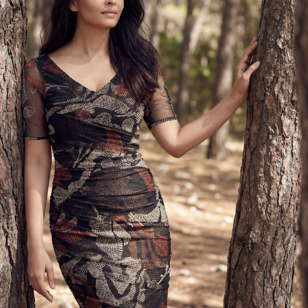 A light summer dress in a structured natural-fiber blend that holds its shape