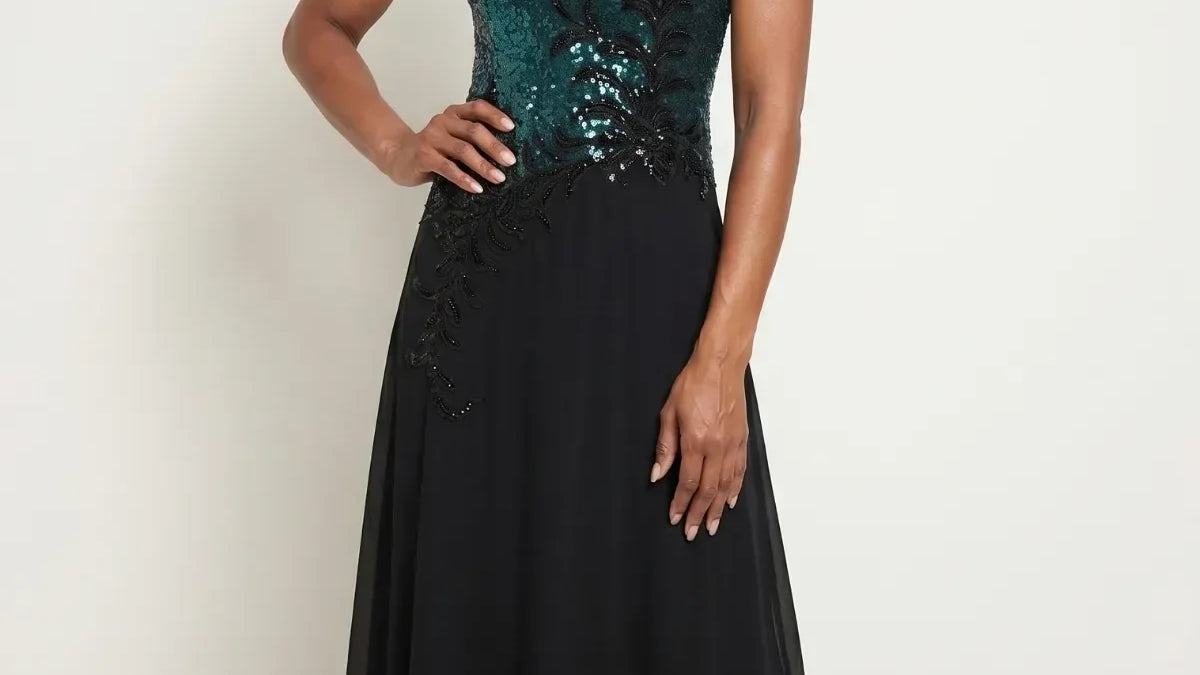 Floor-length evening gown with teal sequined bodice graduating from turquoise to forest green above a flowing black chiffon skirt
