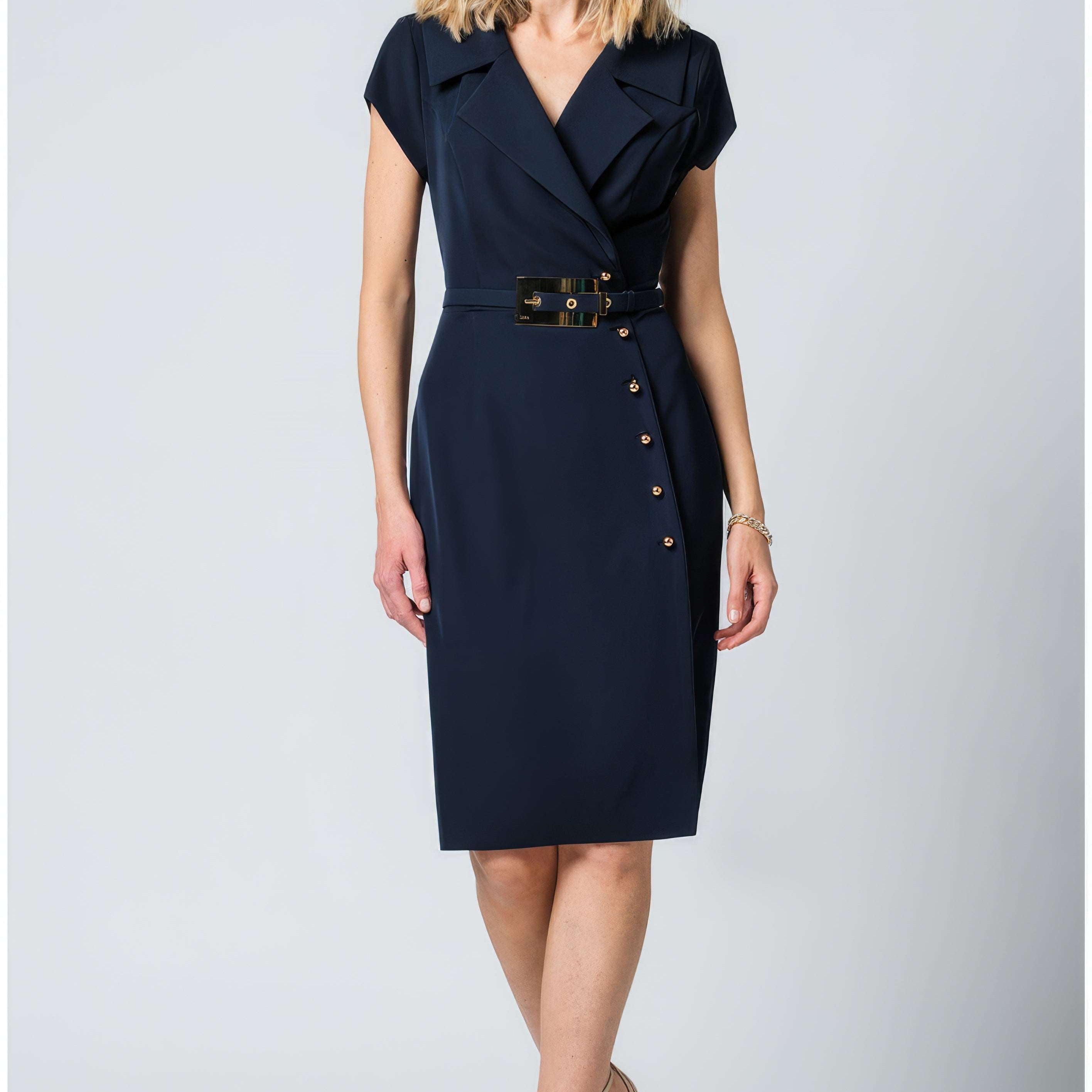 Navy wrap midi dress with short sleeves and a tie waist in rich solid navy, shown on a tailored European silhouette.