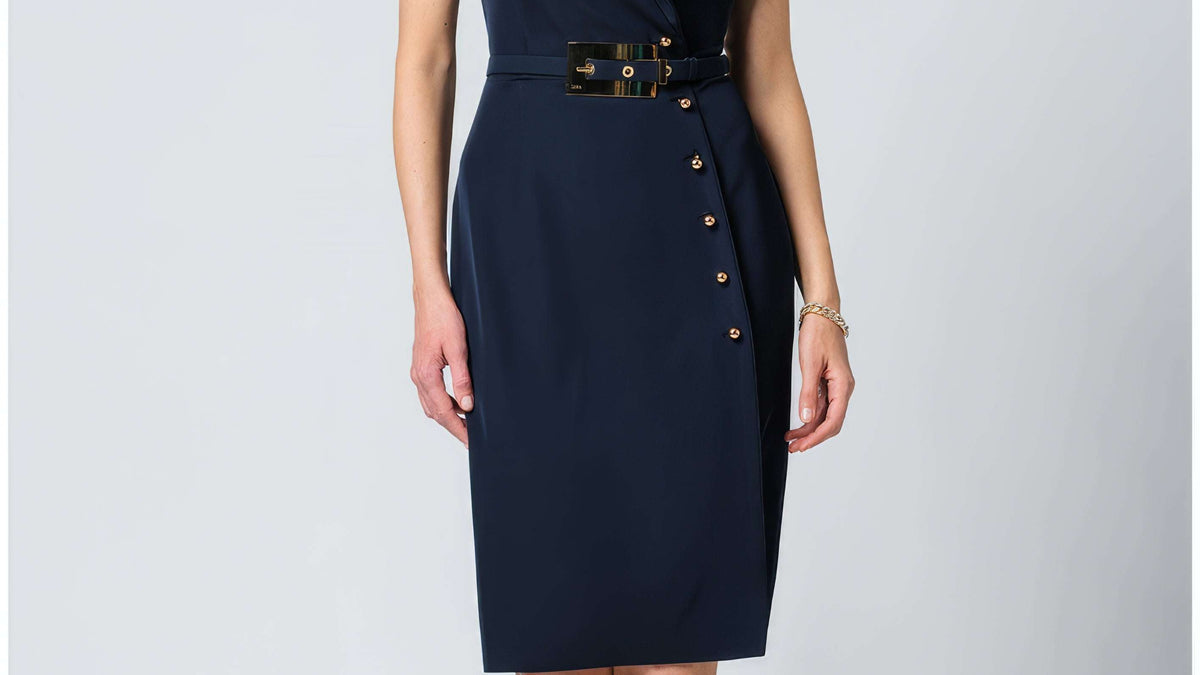 Navy wrap midi dress with short sleeves and tie waist in solid navy, photographed on a neutral background.