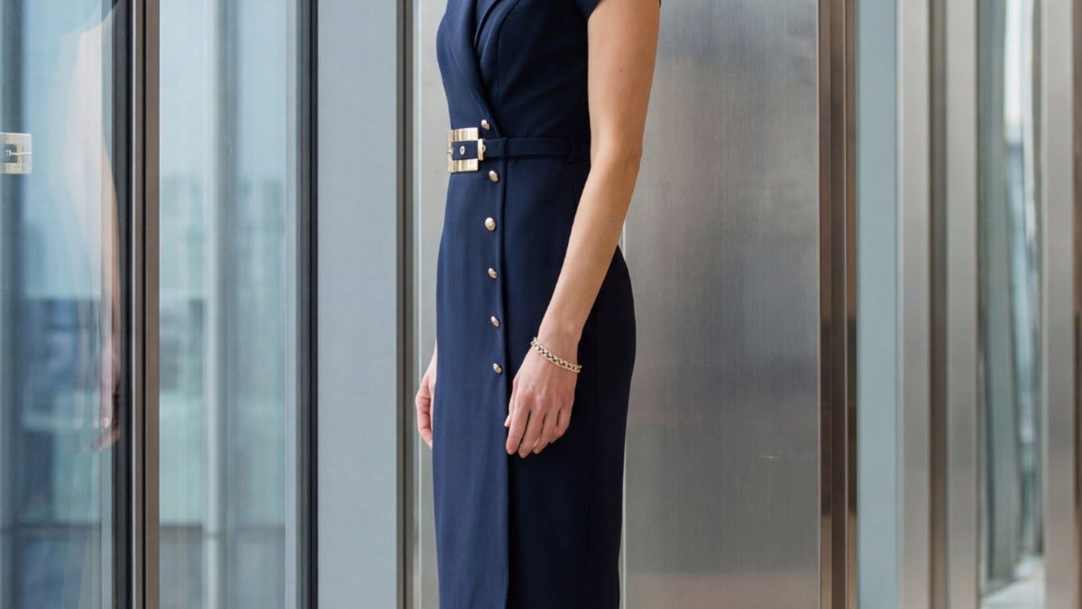 A woman wearing the Luna Olga Wrap Dress In Navy