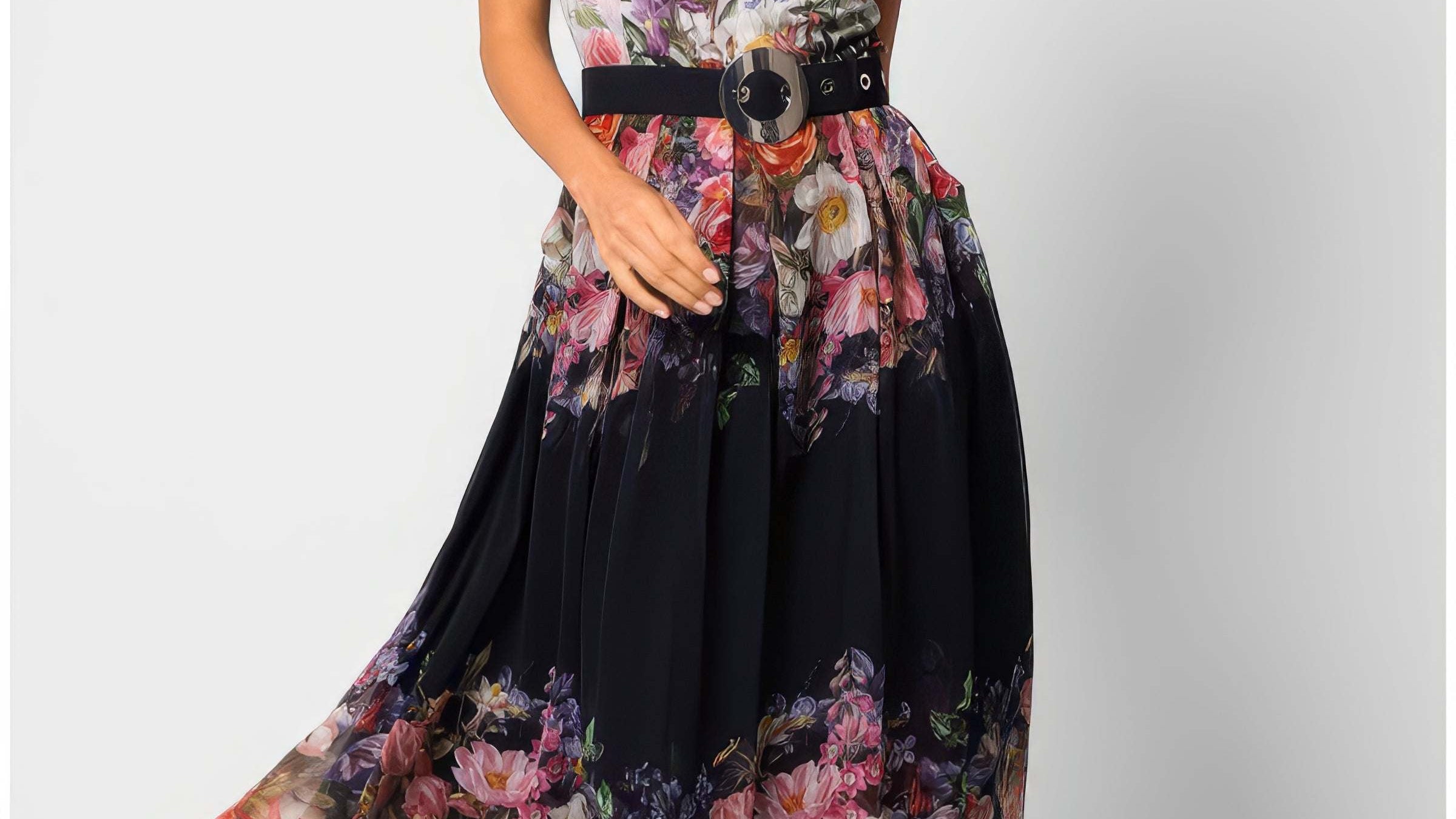 An elegant handmade European midi dress in a floral print displayed against a soft neutral background, suitable for a summer mother of the bride occasion