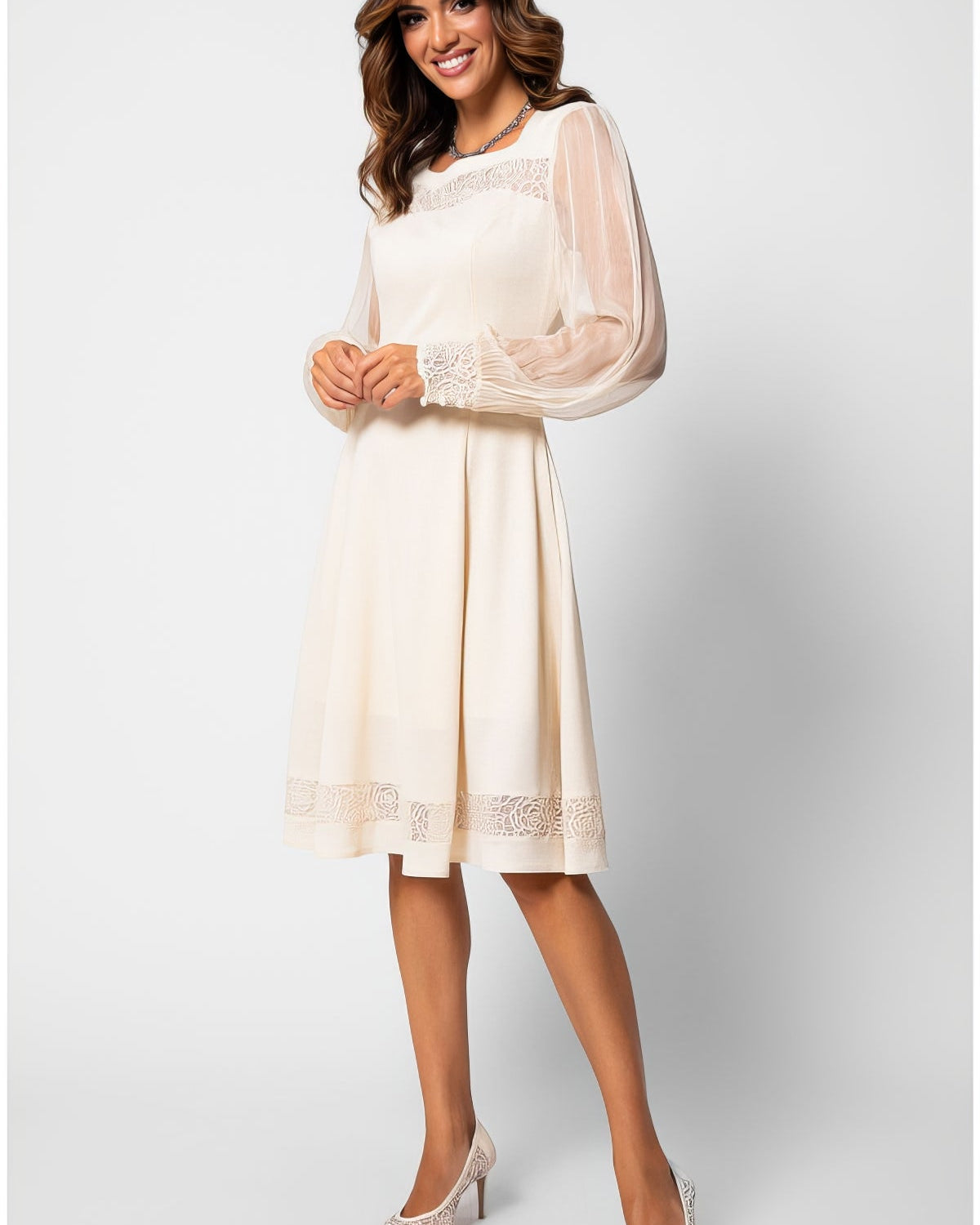 A selection of handmade European occasion gowns from Luna Fashion House including ivory lace, beige lace, navy sheath and navy off-shoulder maxi styles