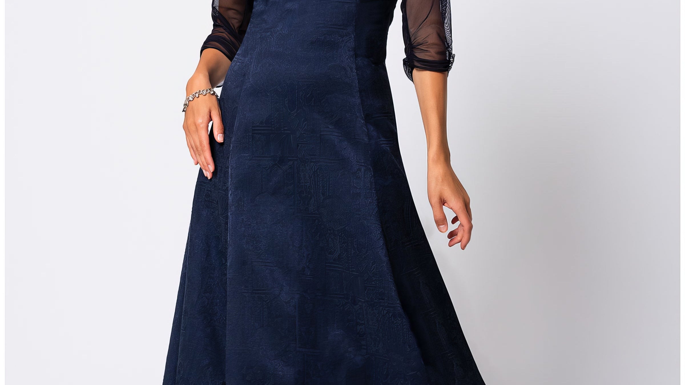 Navy jacquard midi dress with three-quarter sheer sleeves in midnight blue, softly structured silhouette for a business dinner.