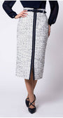 Front view of model in white tweed pencil skirt with navy center zipper and belt