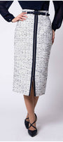 Front view of model in white tweed pencil skirt with navy center zipper and belt