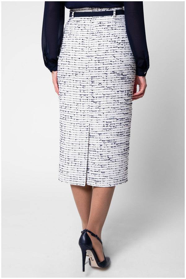 Back view of white tweed pencil skirt with vent and tailored waistband