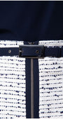 Close up of navy belt and zipper on white tweed pencil skirt
