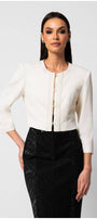 Elegant white cropped tailored blazer jacket with round neckline and front detailing worn with black high-waisted skirt
