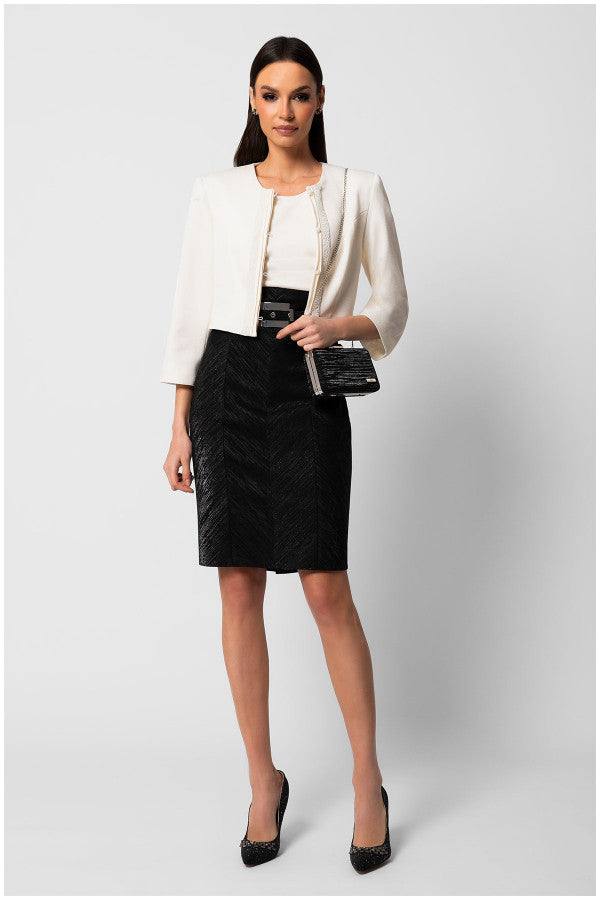 Elegant white cropped tailored blazer jacket Lola with structured silhouette, round neckline, and tailored fit on model