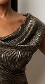 Close detail of the bronze metallic fabric and softly draped neckline showing the crinkled ruched surface
