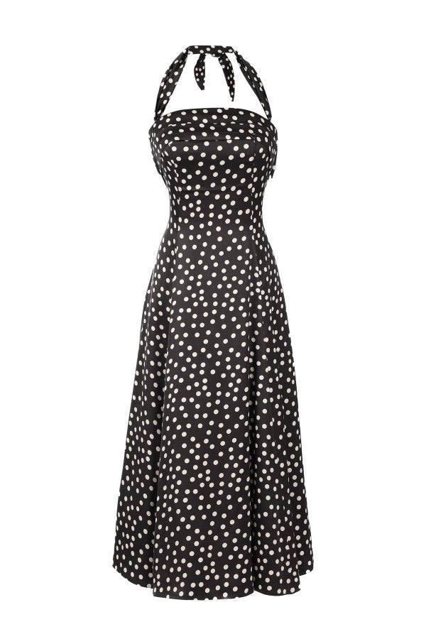 lack elegant midi dress with white polka dots, halter neck, and flattering corset-style bodice for elegant occasions.