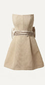 Product front view of Melisa beige strapless mini corset dress with textured fabric and waist sash.