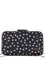 Black structured shoulder bag Melissa with white polka dots and detachable silver chain strap on white background.