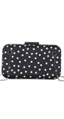 Black evening structured shoulder bag with white polka dots and detachable silver chain strap, elegant and chic design.
