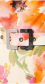 Close-up of floral elegant midi dress  print fabric belt with silver buckle branded Luna on the Amanda Midi Dress waistband