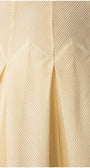 Ivory Midi Dress, Nela. Close up of the pleated ivory fabric.