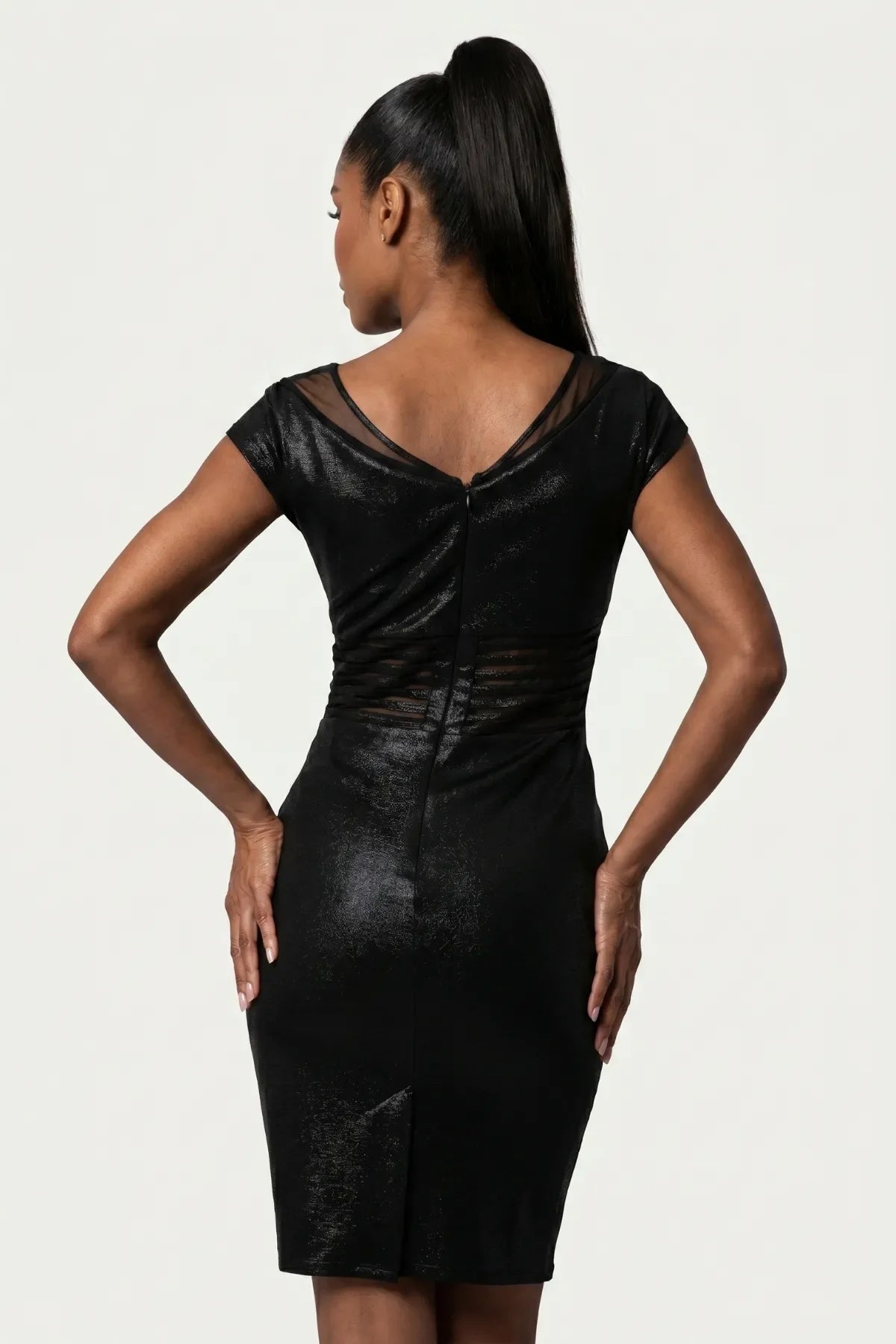 Morgan Short Dress back view in black, sheer V-mesh upper-back panel and beaded waist band continuing around