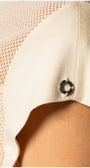 Close-up of sleeve detail on Aria Short-Sleeve Blouse in Ivory showing fabric texture and metal embellishment